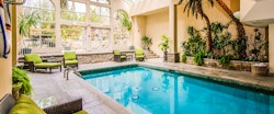 Sun-filled Pool Atrium at Queen’s Landing by Vintage Hotels, Ontario
