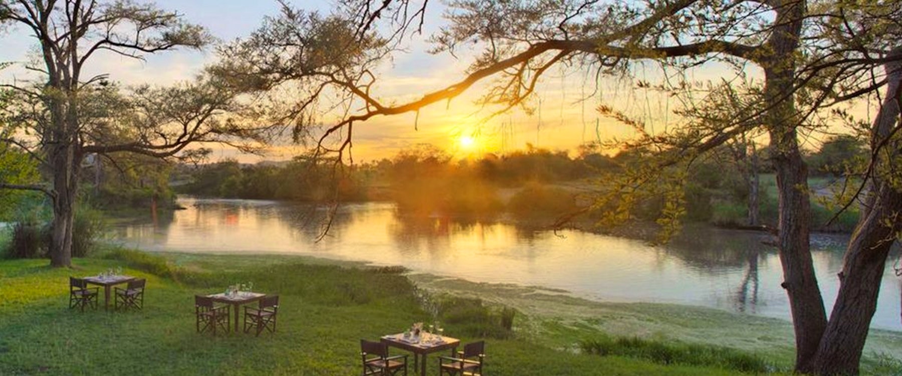 Dine with a sunset view at &Beyond Grumeti Serengeti Tented Camp