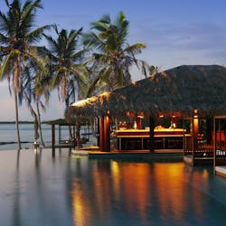 The Beach Bar by Dusk at The Residence Maldives, Indian Ocean