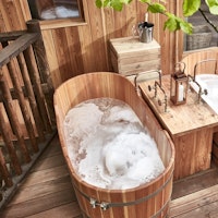 Treehouse Bath at The Fish, Farncombe Estate, England, UK