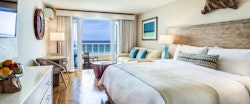 Oceanfront Bedroom at Waves Hotel and Spa by Elegant Hotels, Barbados