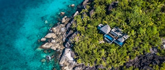 Enjoy an villa getaway to the exotic Seychelles at this archipelago paradise 