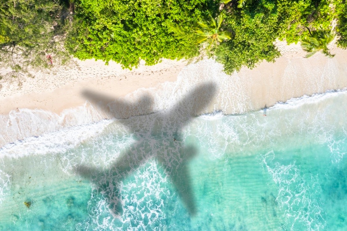 Plane soaring over Seychelles