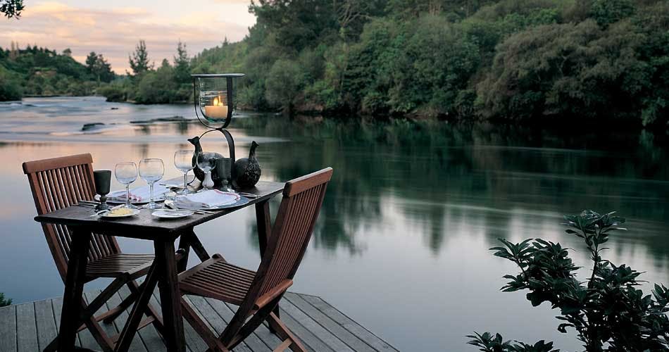 Dining next to the lake at Huka Lodge Lake Taupo