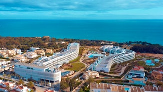 Escape to this trendy luxury resort in the Algarve next to the beautiful Evaristo Beach
