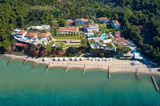 Escape to this luxury resort in Halkidiki with a private white sandy beach and Greece’s biggest wine cellar