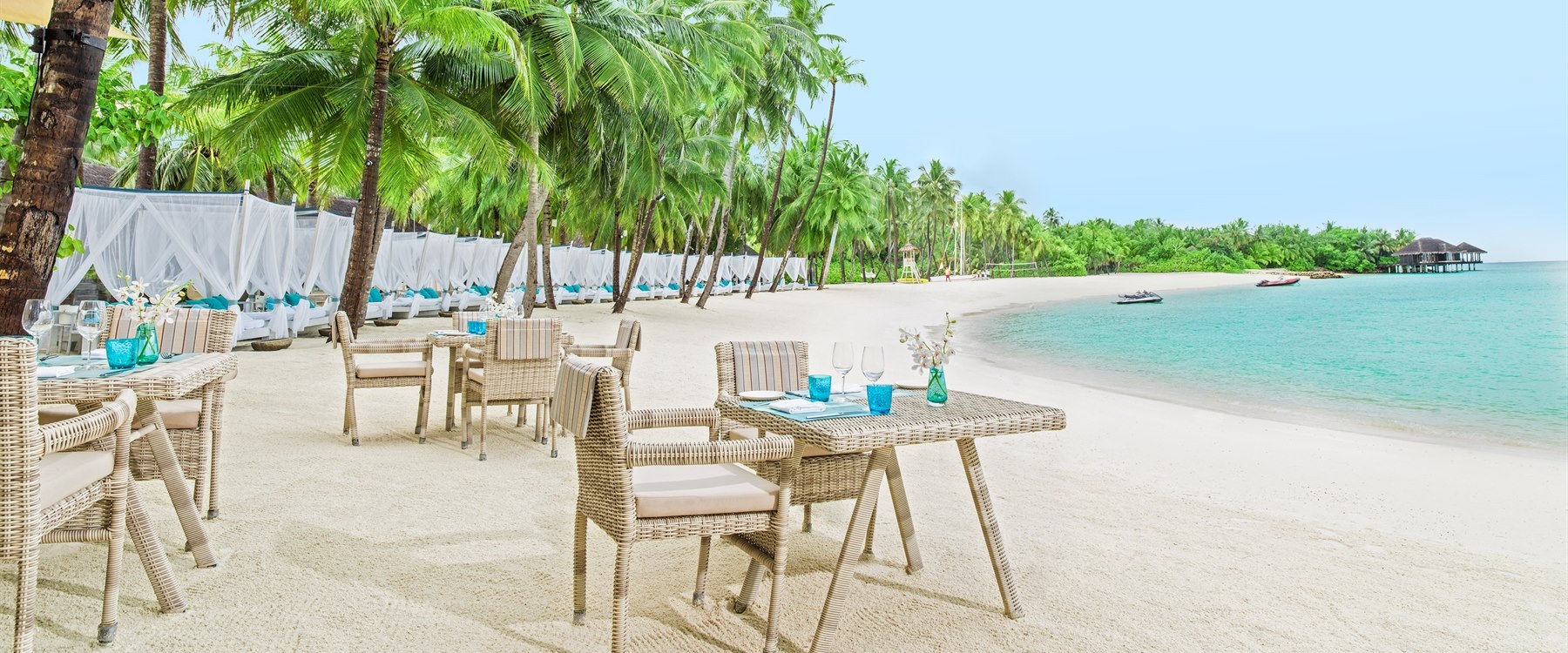 Dining area at the beach club at One&Only Reethi Rah, Maldives