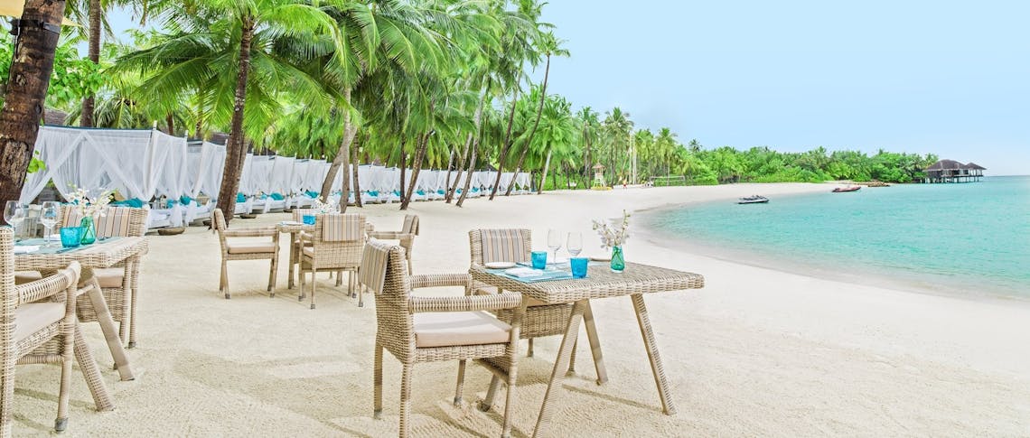 Dining area at the beach club at One&Only Reethi Rah, Maldives