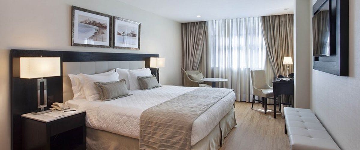 Superior bedroom at Miramar Hotel by Windsor, Brazil 