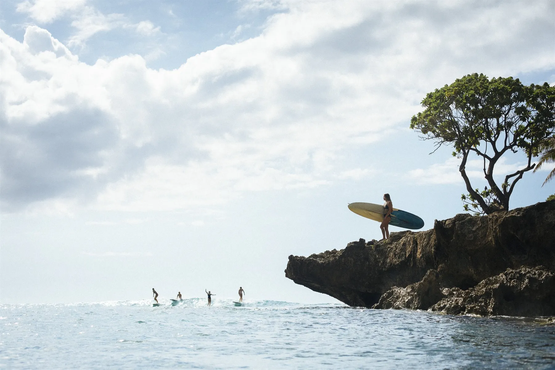 Surfers at the Point at Sunset Pool Bar, The Ritz-Carlton O‘ahu, Turtle Bay, Hawaii